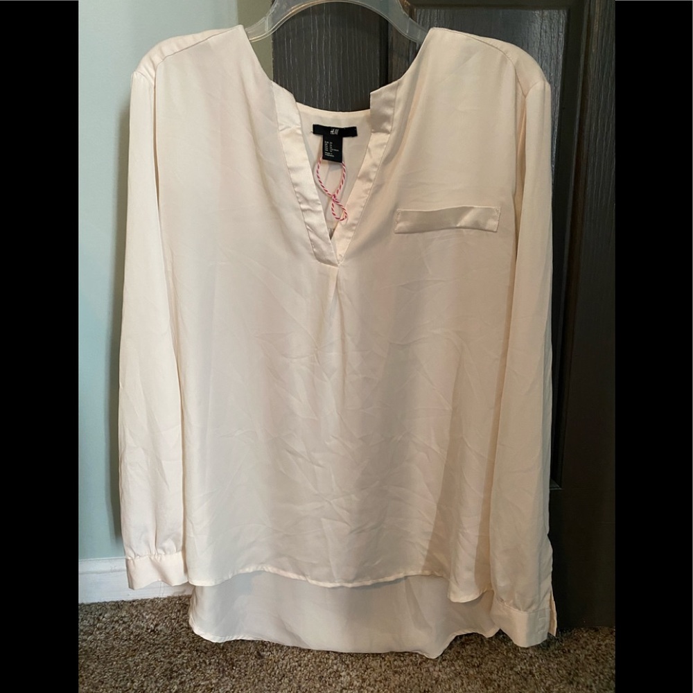 Cream H& M blouse with faux pocket detail